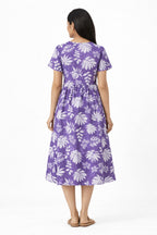 Made in pure cotton, this dress is breathable, soft on the skin, and ideal for all-day comfort. The tropical leaf print paired with a wrap-style bodice and short sleeves gives it a relaxed yet feminine look. Perfect for everyday wear, summer outings, or casual occasions.

Material: Printed cotton
Short sleeves
Sleeve length: 5"
Dress length: 46"