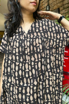 Material: Printed cotton
Short sleeves